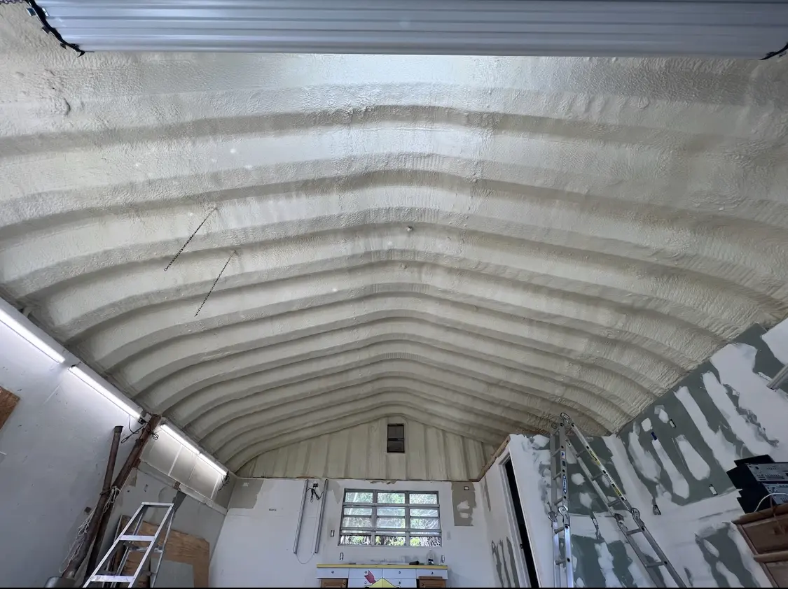 Spray polyurethane foam applied to the underside of a metal roof deck in Upper Saddle River